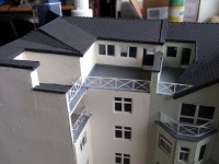 Die oberen Wohnungen haben etwas: Große Dachloggia
